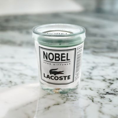 شمع معطر رایحه Lacoste برند نوبل